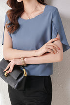 Round Neck Flare Sleeve Asymmetrical Blouse - 2 Colors Available